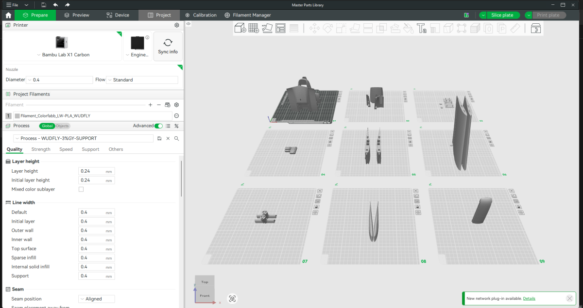Spectre printed parts arranged across Bambu Studio build plates